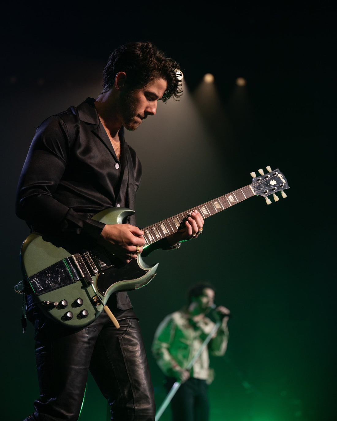 Nick Jonas of the Jonas brothers with Gibson SG refretted by Feline Guitars